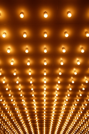 Theatre marquee sign lights rows at a theater entranceの写真素材