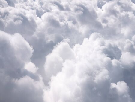 Photo of puffy clouds taken from above the clouds. Usable as a background or for a cloud computing...