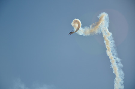 A stunt plane performance at an air show.のeditorial素材