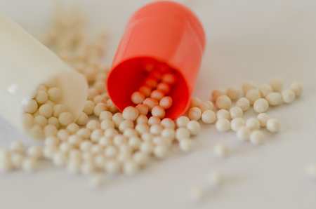 Chemicals inside tiny capsules of the drug.Top view.shallow depth of fieldの写真素材