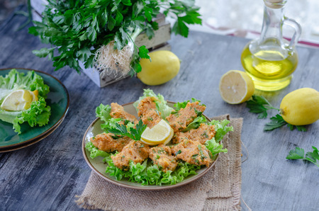 Turkish traditional food, lentil balls with fresh herbs, decorated background, selective focus, top view.の写真素材