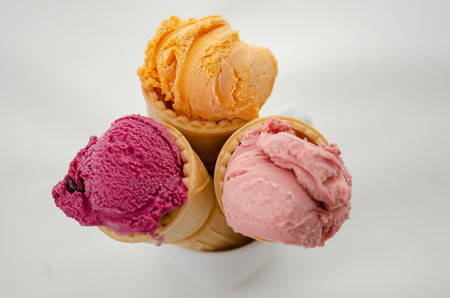 Set of ice cream in waffle cone isolated on white background.