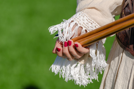 Traditional Archery. Traditional archery equipment.Female archerの写真素材