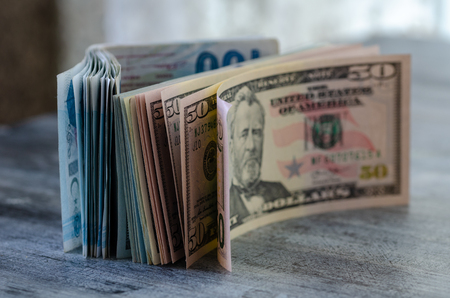 Cash dollars and turkish liras  on the table.