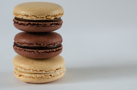 Two colors macaroons are on the white background, copy space.の写真素材