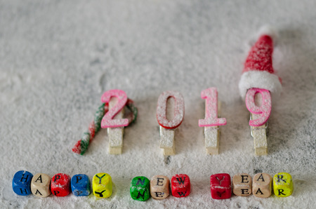 Decorative Christmas/New Year composition with snow.Colorful message: Happy new year on the white background.の写真素材