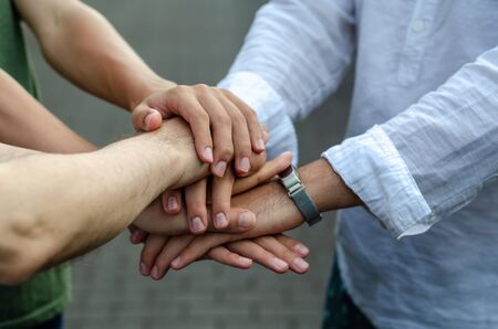 Teamwork with join hands and standing together for cooperation success business,の写真素材
