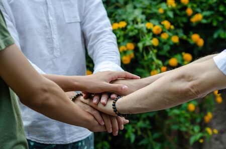 Teamwork with join hands and standing together for cooperation success business,の写真素材