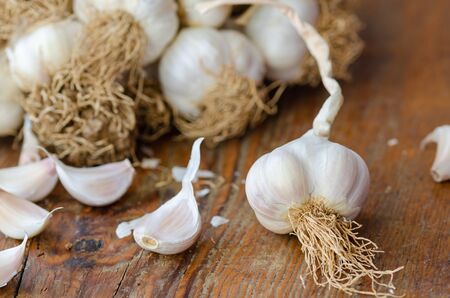 Set of garlic on wooden boardの写真素材