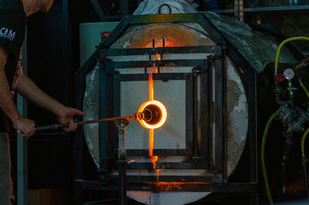 Eskisehir,TURKEY-September 27,2019: OdunpazarÄ± 7th international glass festival.Artisan working with fireのeditorial素材