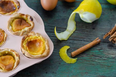 Portuguese egg tart pastry Pastel de nata on the wooden table,