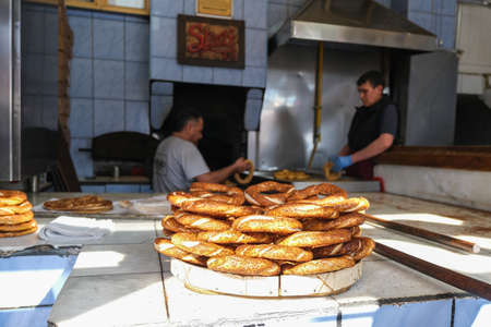 Eskisehir,TURKEY-March 03,2020: Chef is making Turkish Bagel  at the oven