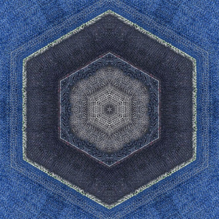 Blue jeans texture with a kaleidoscope pattern in the center.