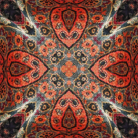 abstract background with a kaleidoscope pattern in orange and black
