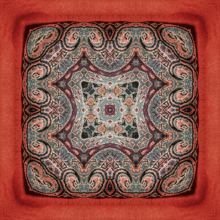 Fabric silk texture with a kaleidoscope pattern in red.