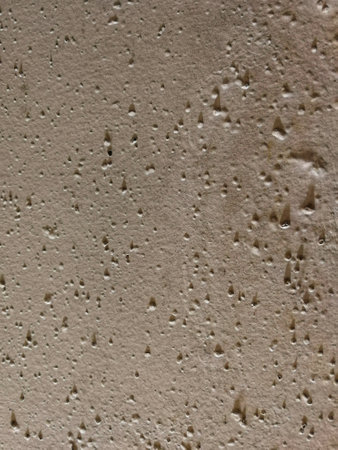 Abstract background of a concrete wall with scratches and cracks. High quality photo
