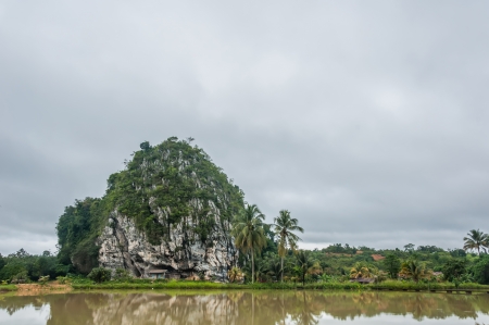 Cave beside the lake in Gua Musang, Kelantanの写真素材