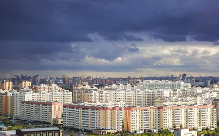 Stormy skies over the city's high-rise district.のeditorial素材