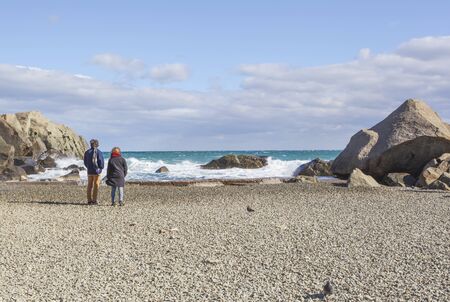 The guy with the girl on the beach.の写真素材