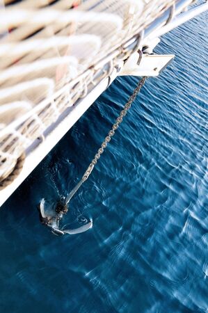 Anchor pulling a sailboat at the anchorageの写真素材