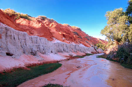 Stream flowing between the dunes, Mui Ne, Vietnamの写真素材