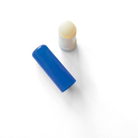 Lip balm on a white background with shadowの写真素材