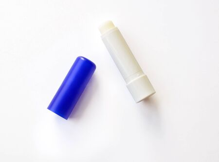 Lip balm on a white background with shadowの写真素材