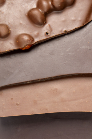 A closeup of pieces of a chocolate (dark, milk).の写真素材