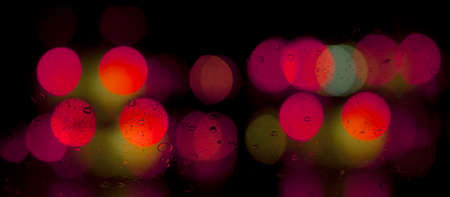 Red and yellow lights on the black background.