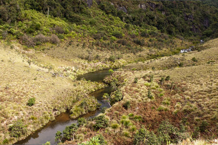 The landscape with montane grasslands, a river and montane evergreen forests. Horton Plains National Park. Sri Lankaの写真素材