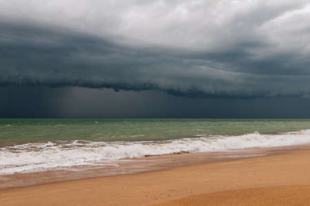 The landscape with the dark stormy sky and the sea.の写真素材