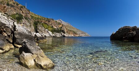 Small pebbles beach, Lo Zingaro Nature Reserve in Sicily, Italyの写真素材