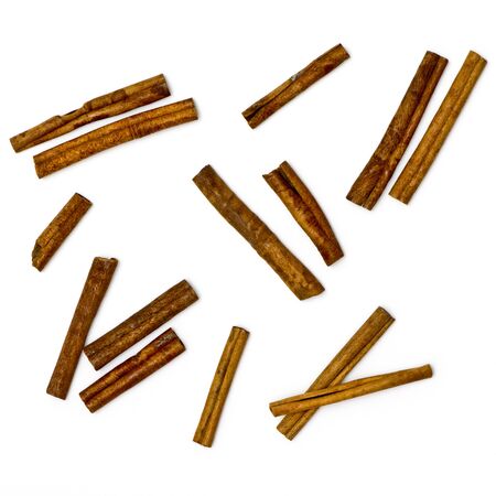 Several cinnamon sticks on a white background. View from aboveの写真素材