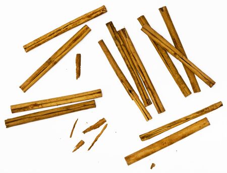 Cinnamon sticks on a white background. View from aboveの写真素材