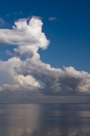 The landscape with white clouds over the Indian Ocean. の写真素材