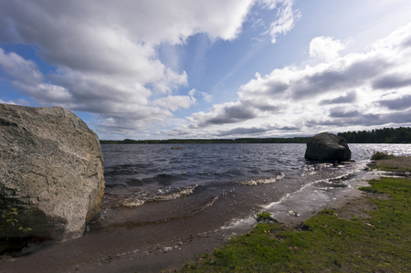 Landscape with a lake and the sky in late summer. BÃ¶les-Noran lake, Swedenの写真素材