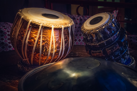 ethnic musical instrument tabla in the interior of the chill-outの写真素材