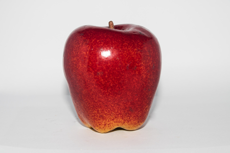 Dark-red apple. Isolated on a white backgroundの写真素材