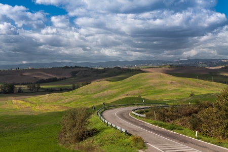 road and fields in Tuscanyの写真素材