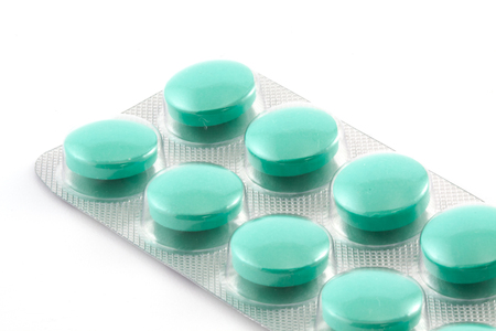 green pills in a blisterの写真素材