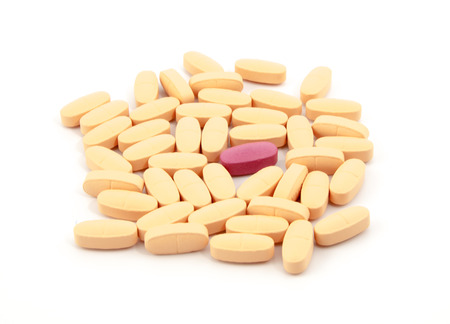 vitamin pills on a white backgroundの写真素材
