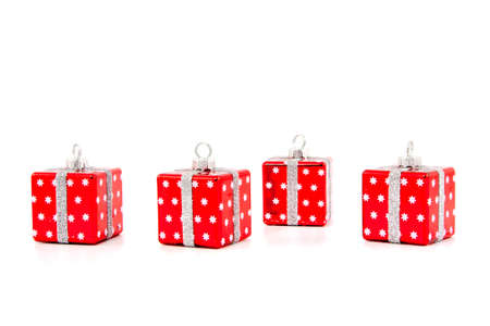 Red Christmas toys on a white backgroundの写真素材