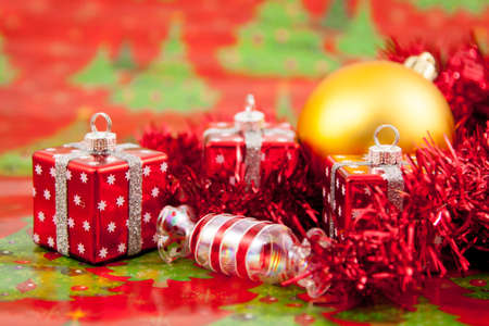 Red Christmas toys on a red backgroundの写真素材