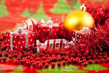 Red Christmas toys on a red backgroundの写真素材