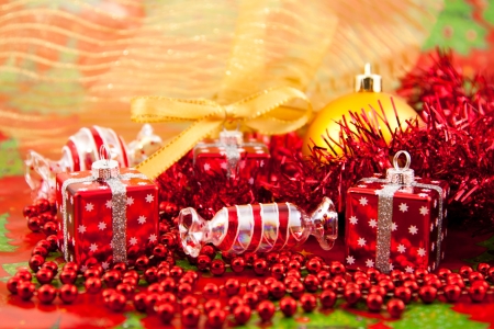 Red Christmas toys on a red backgroundの写真素材