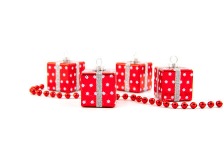 Red Christmas toys on a white background