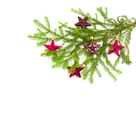 Xmas tree with toys on a white backgroundの写真素材
