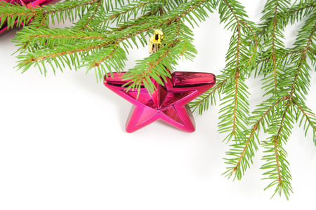 Xmas tree with toys on a white backgroundの写真素材