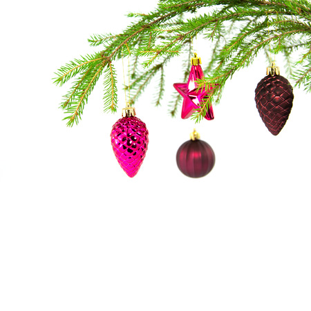 Xmas tree with toys on a white backgroundの写真素材