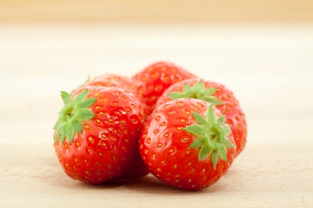 Red strawberries on the wood backgroundの写真素材